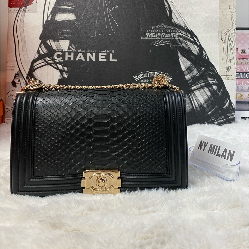 CHANEL
Medium Python Boy Bag